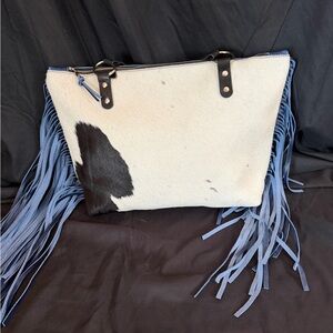 Jill Homestead cowhide and leather daisy bag and wallet.
